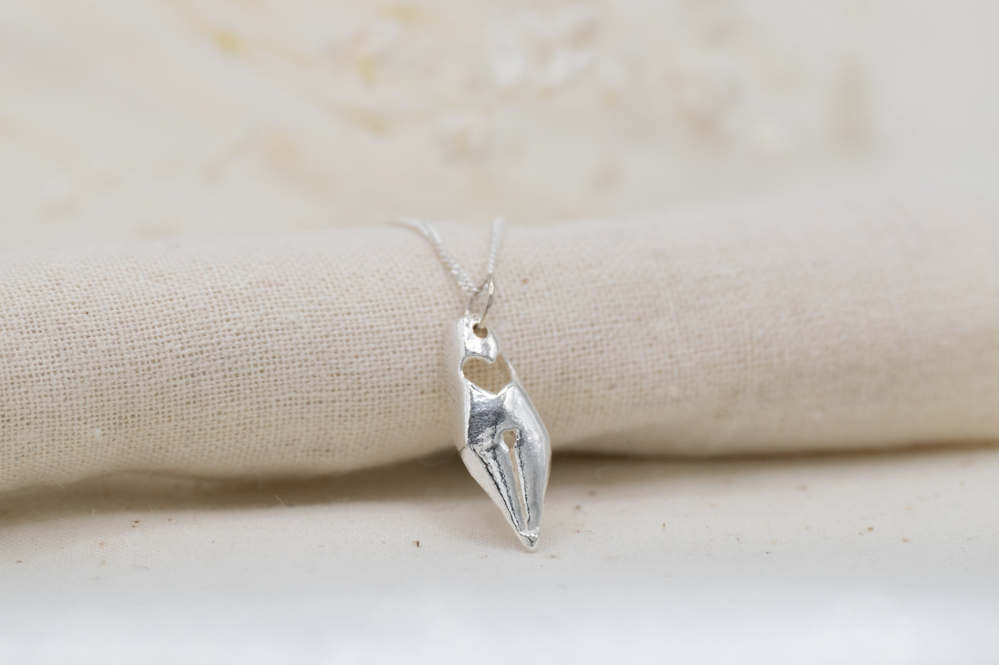 a pen nib necklace for female writers