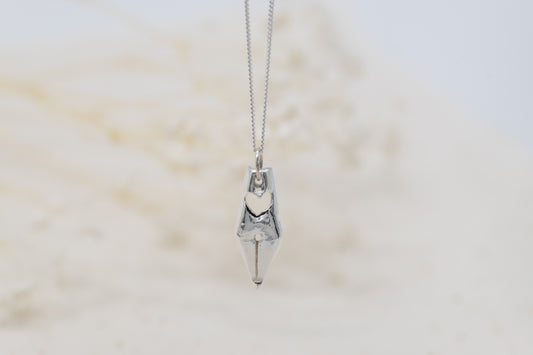 a silver pen nib necklace for writers