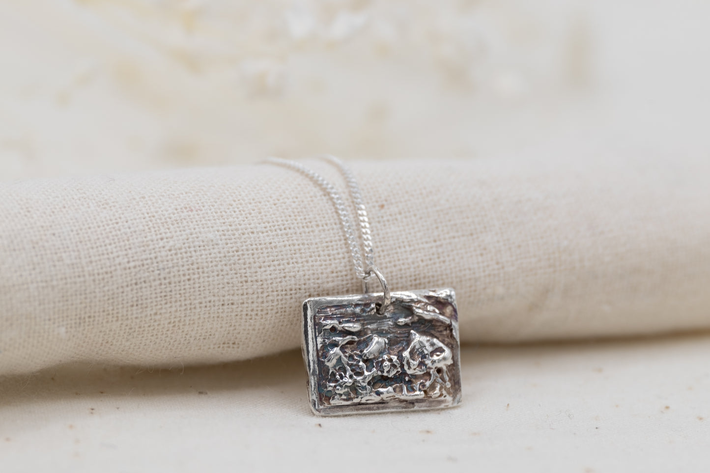 a postcard customizable necklace for women