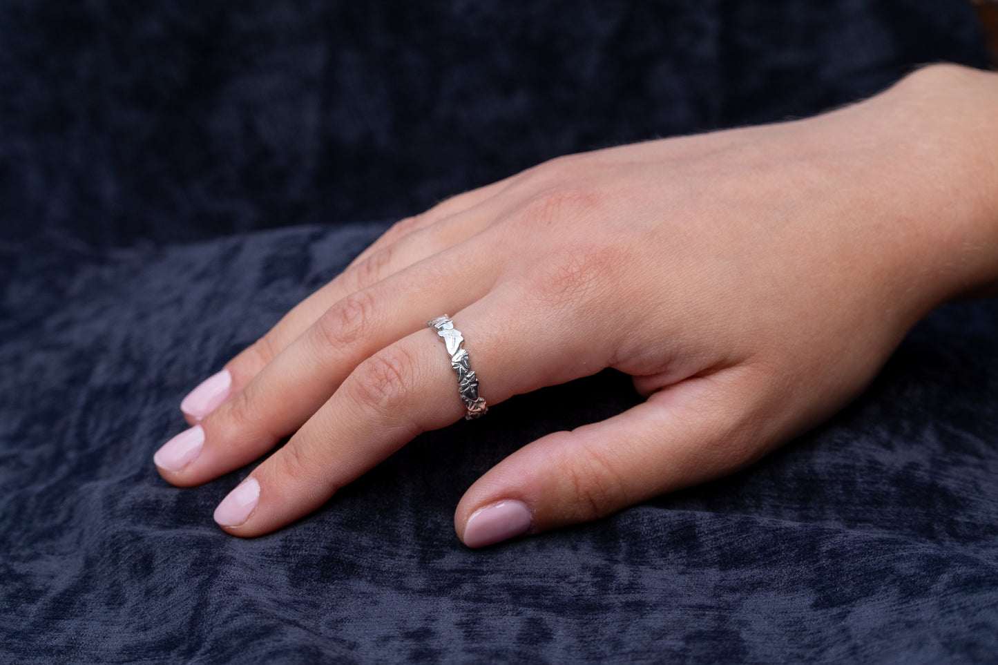 silver slim endless ivy ring worn on hand
