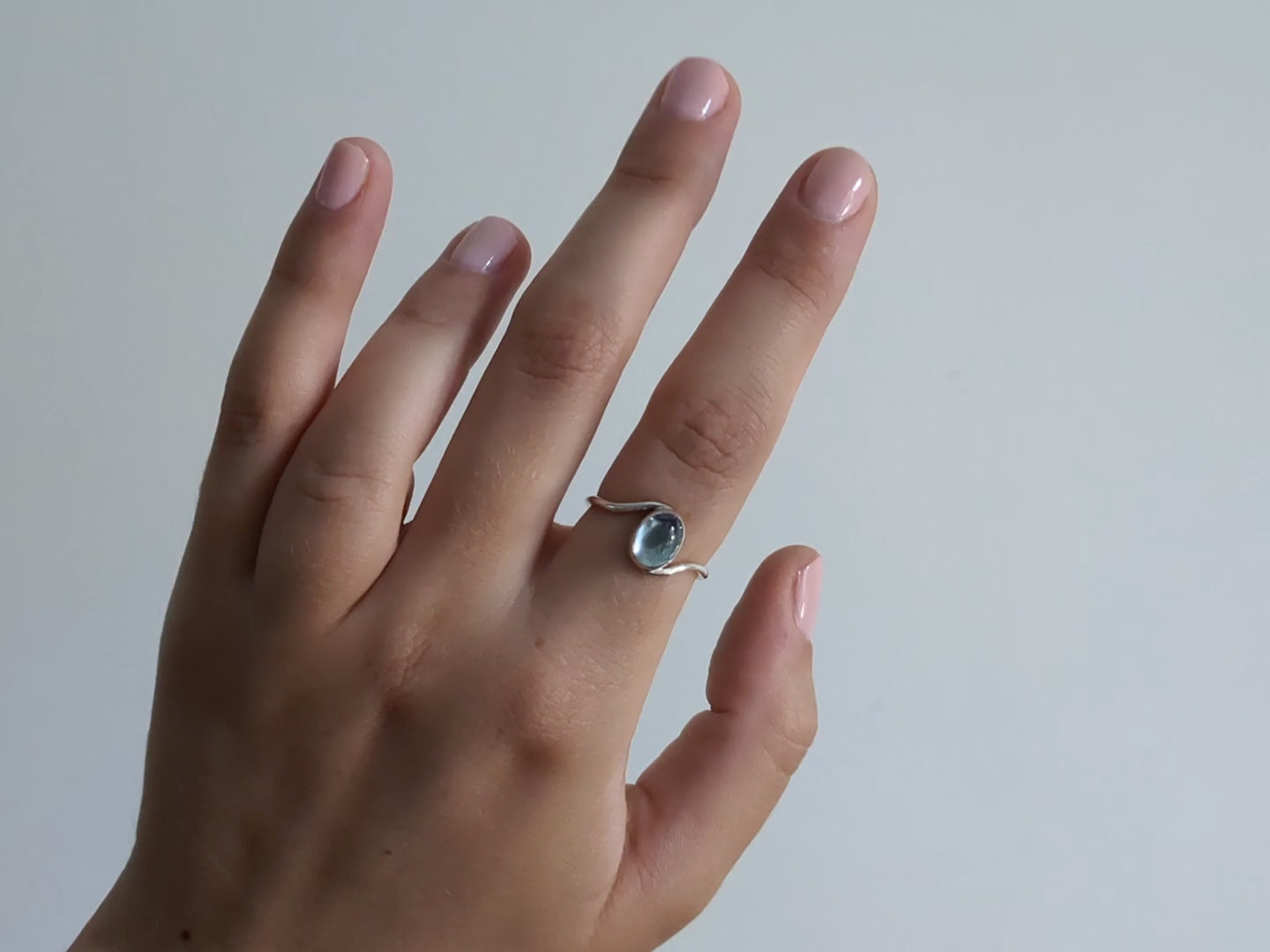 video of my silver ocean wave topaz ring being worn