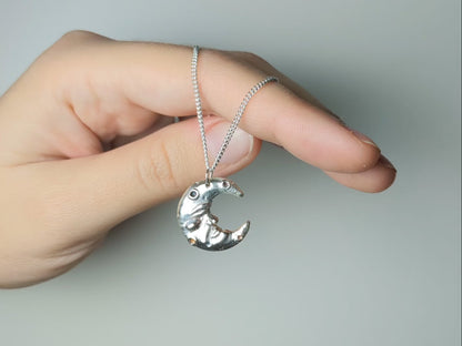 The Man in the Crescent Moon Necklace
