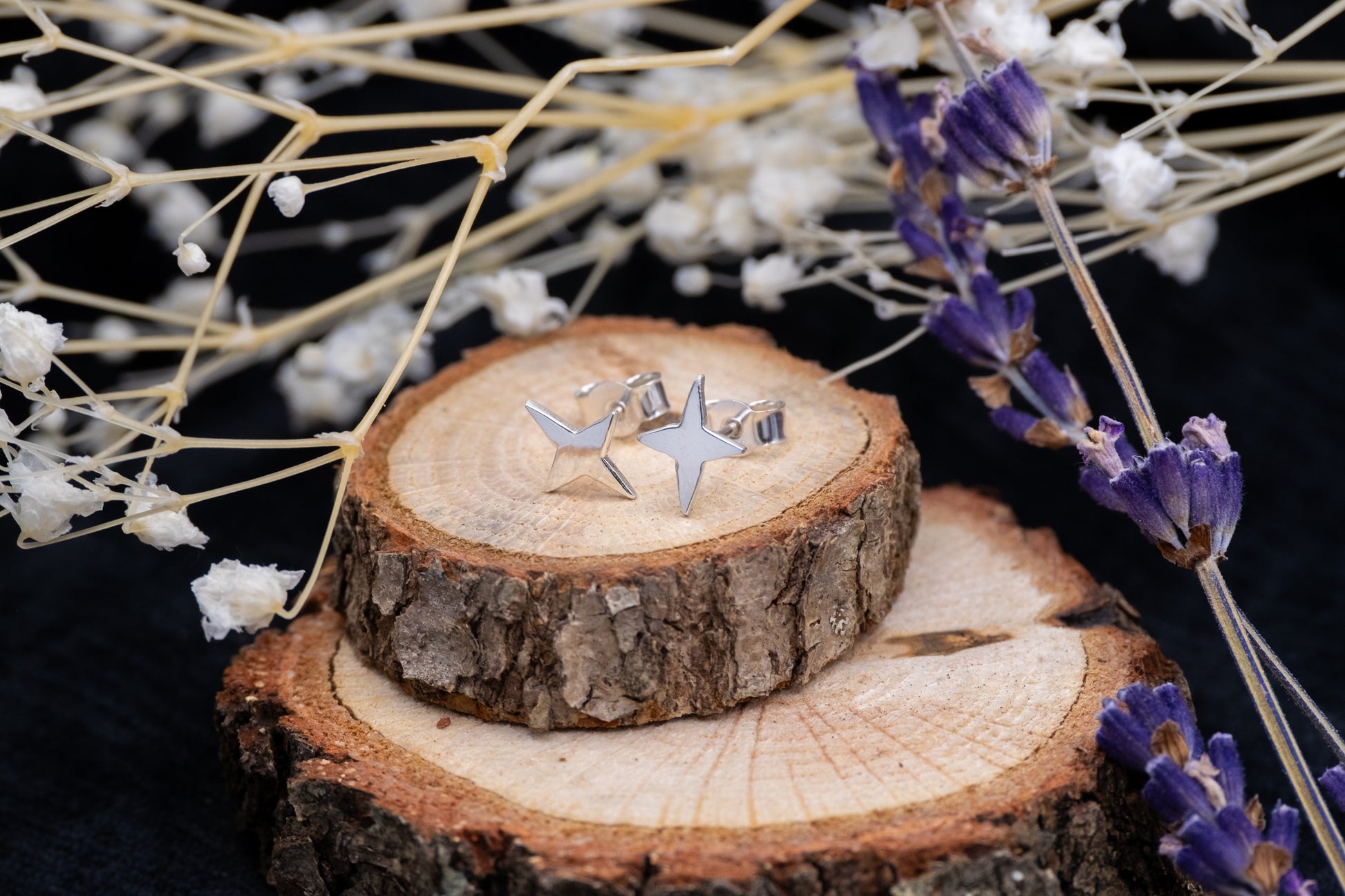 silver star shaped studs on wood with flowers