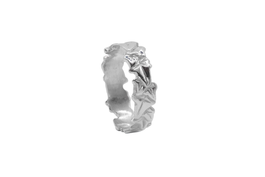 a wide silver ivy leaf ring on a white background